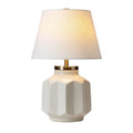 **Titre technique : Lampe de table en céramique blanche avec abat-jour en tissu**